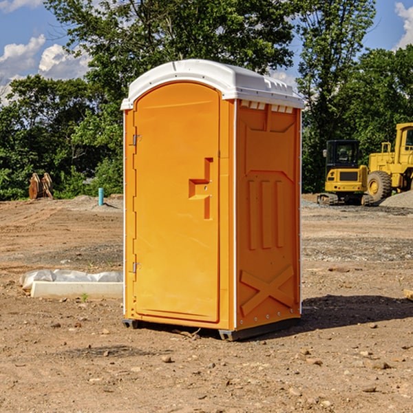 how often are the portable restrooms cleaned and serviced during a rental period in Paola